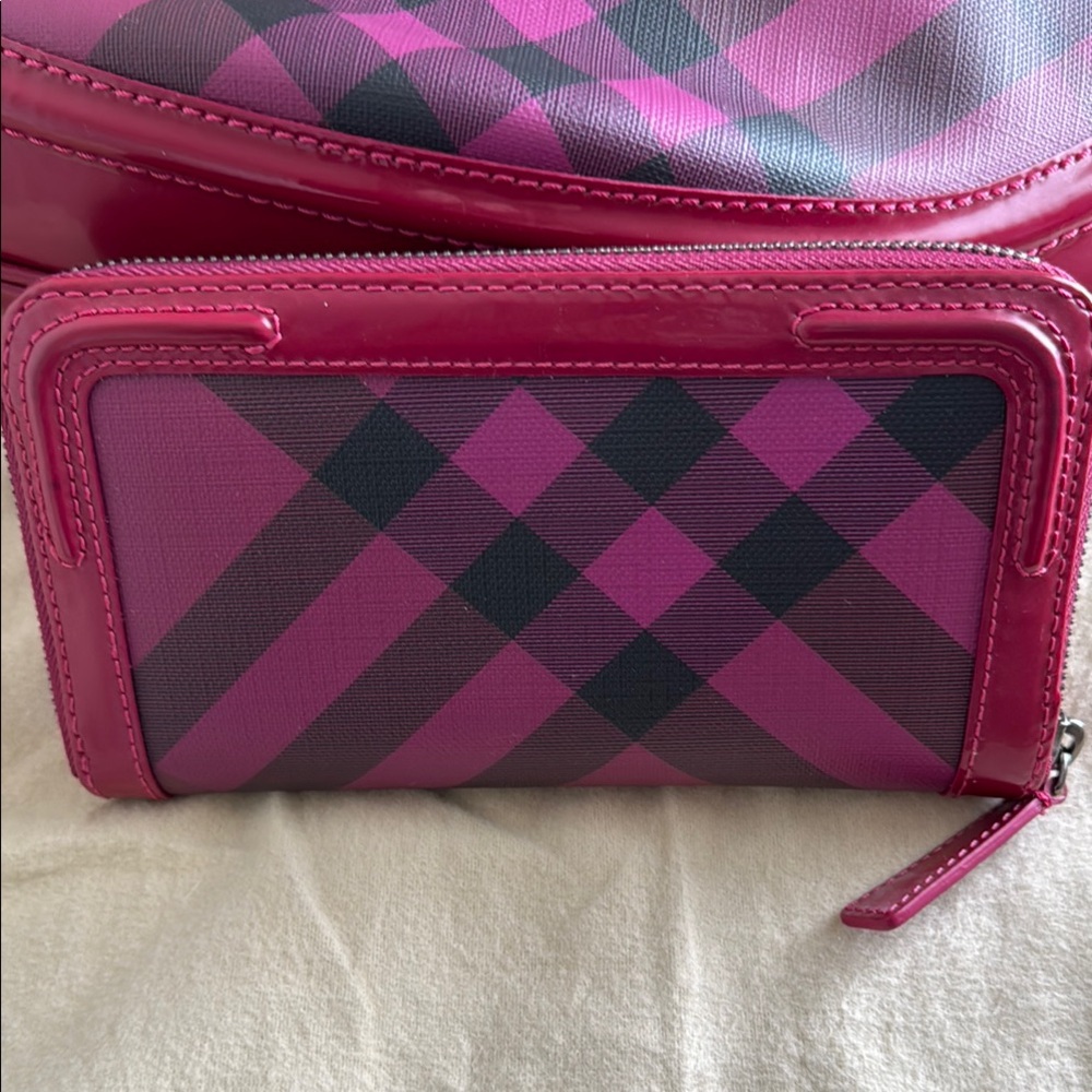 Burberry Pink and Black Wallet with Bold Plaid Design